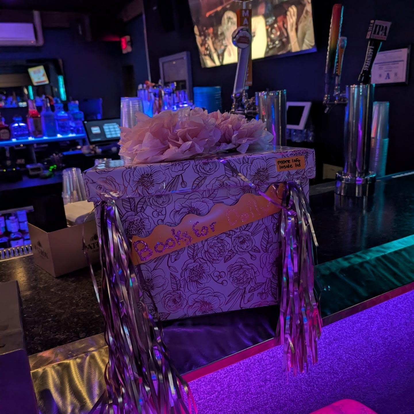A floral Books for Dolly donation box at QUADZ Las Vegas